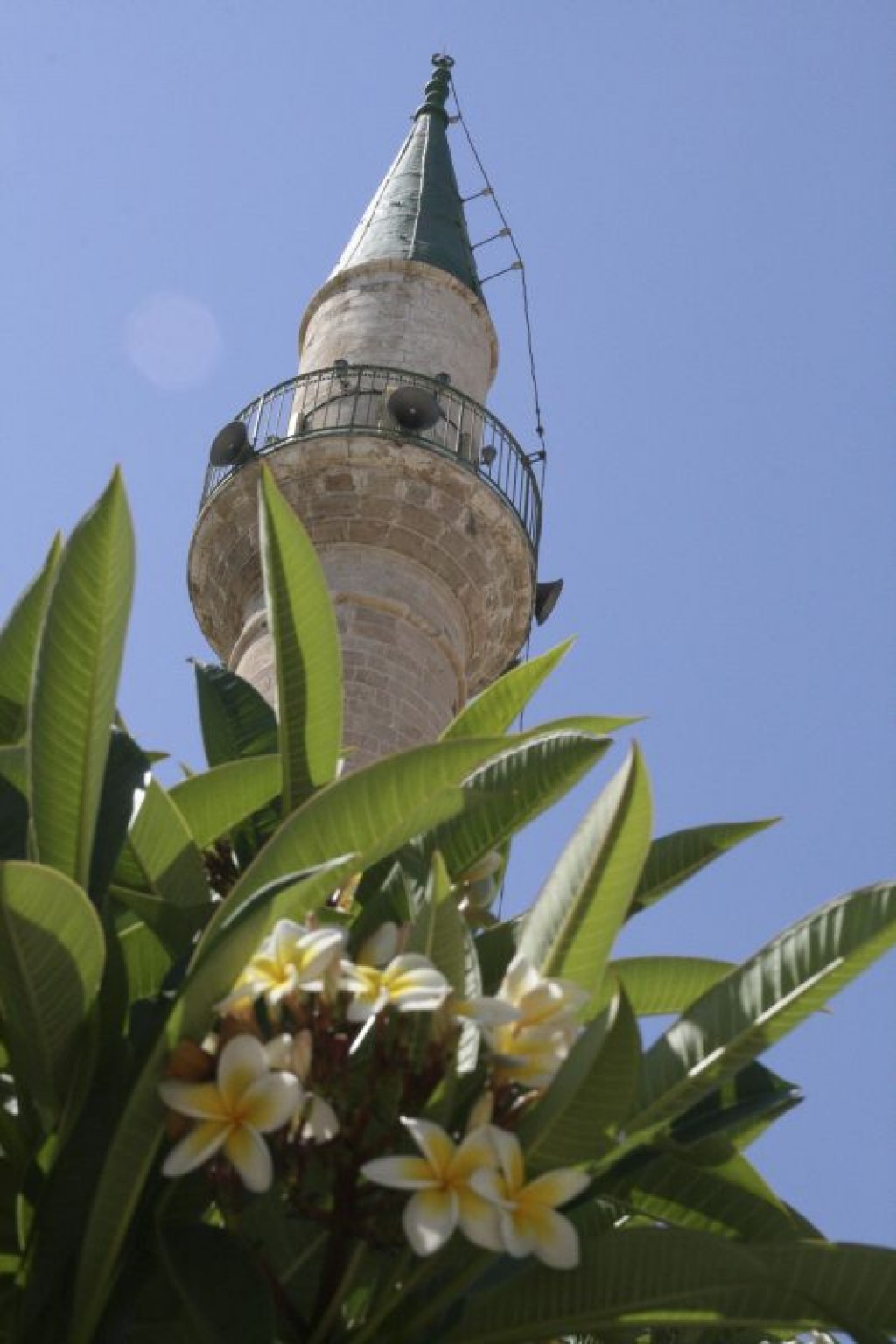Looking up at the Minaret of the al-Jazaar Mosque.